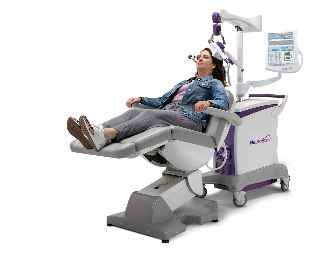 Neurostar TMS Therapy example of woman reclined in therapy chair