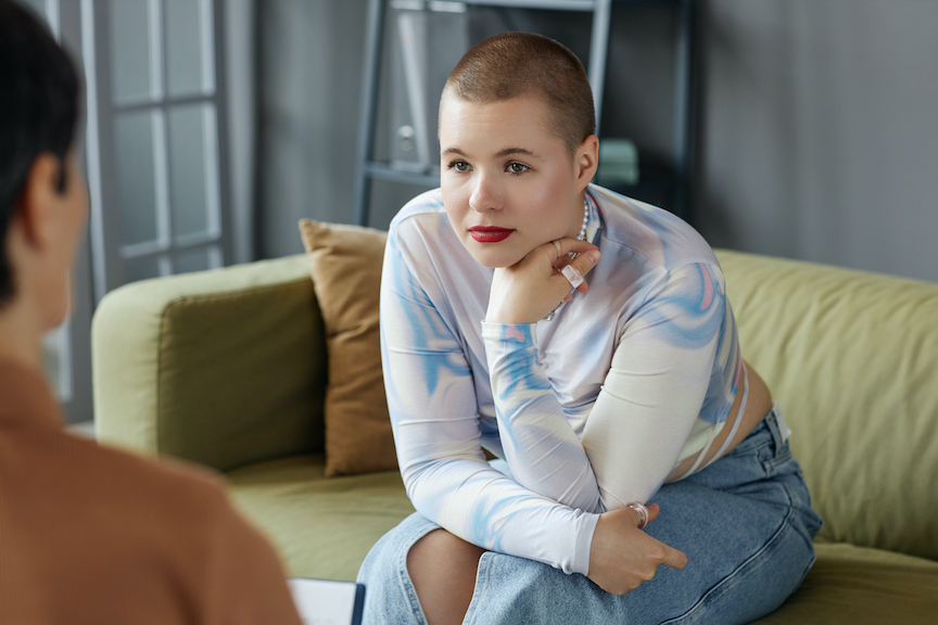 Young woman listening to her therapist.